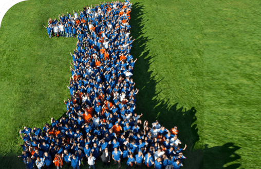  Aerial photo of Regeneron employees forming a numerical one.