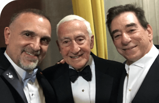  Co-Founder, Board co-Chair, President and CSO George D. Yancopoulos, MD, PhD, former Board Chairman P. Roy Vagelos, MD, and co-Founder, Board co-Chair, President and CEO Leonard S. Schleifer, MD, PhD, posing together.