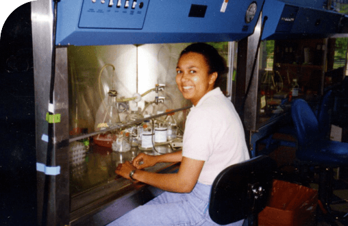  Regeneron employee working in a drug manufacturing facility.