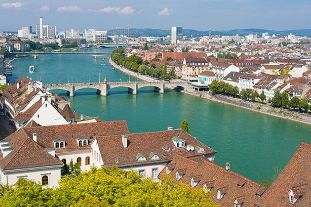 Regeneron location in Basel, Switzerland. Skyline of Basel, Switzerland with the Grosspeter Tower.