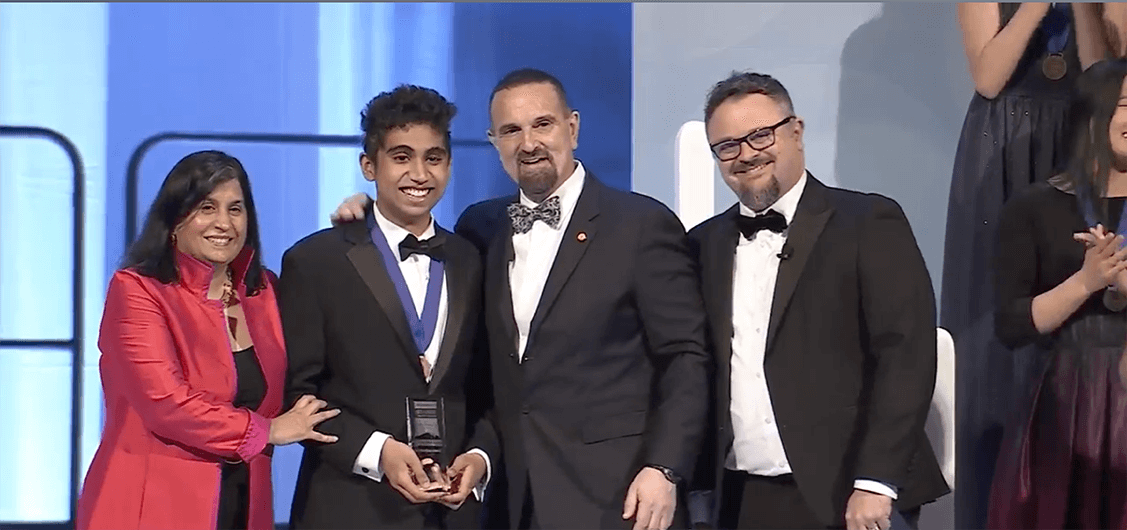 Video featuring various STEM programming produced or sponsored by Regeneron. Photo includes George D. Yancopoulos, MD, PhD, co-Founder, Board co-Chair, President and Chief Scientific Officer of Regeneron presenting the top award at the 2023 Regeneron Science Talent Search.