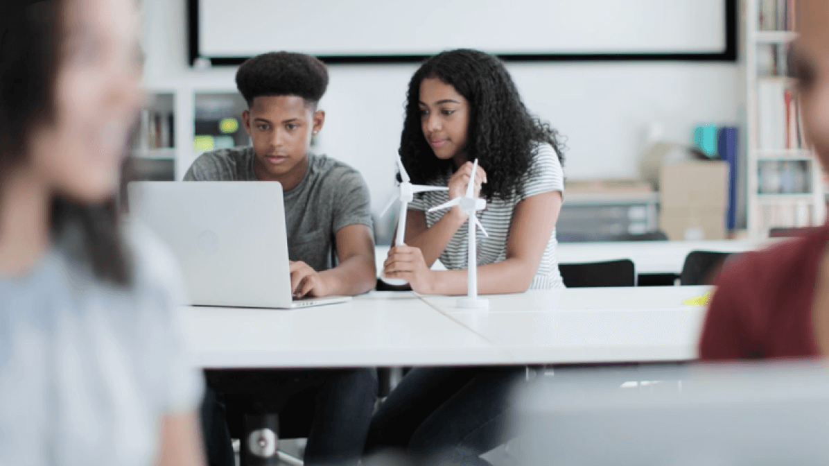 Video featuring two students working together in a classroom.